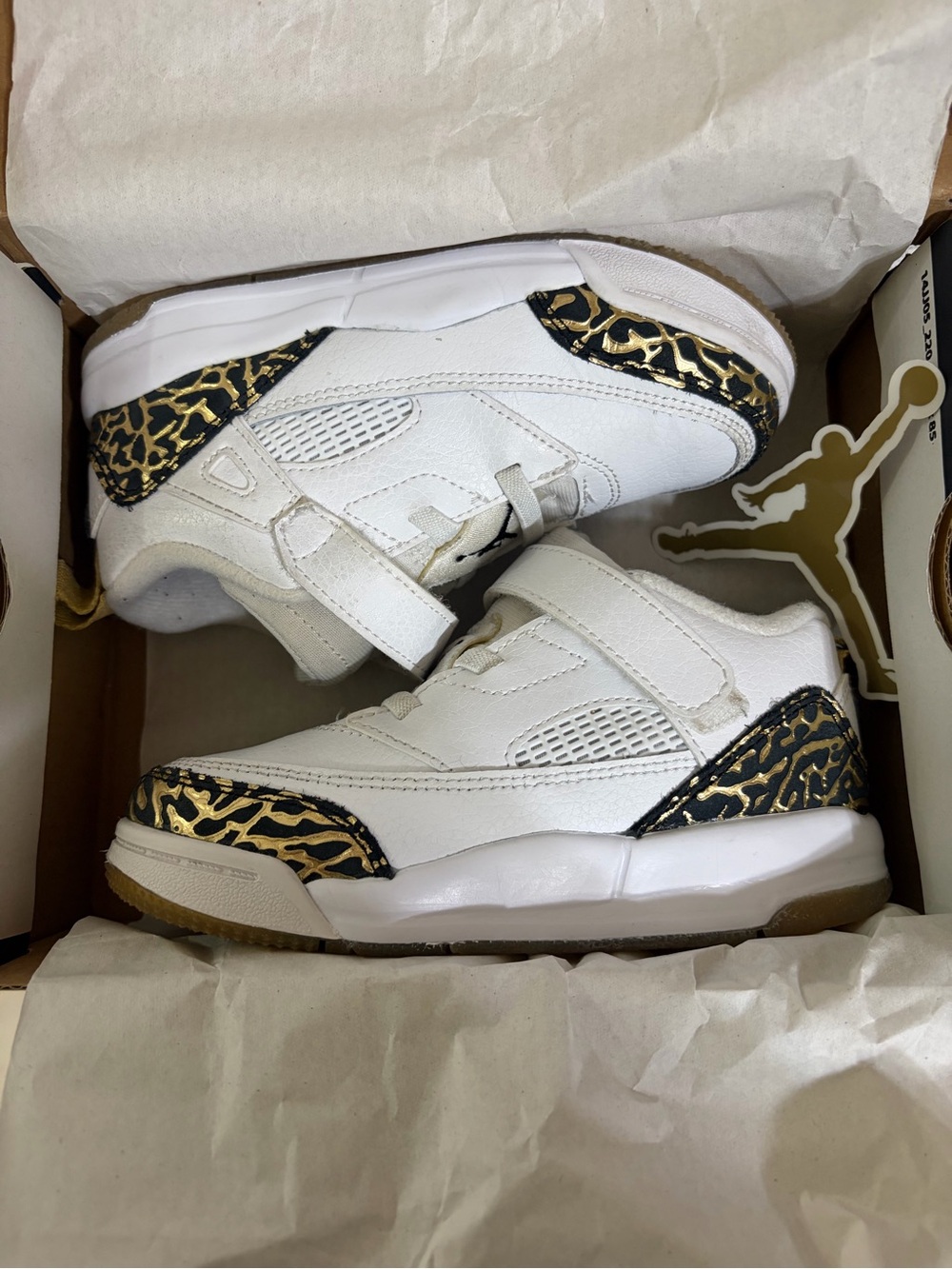 Jordan Kids White Sneakers with Black and Gold Accents